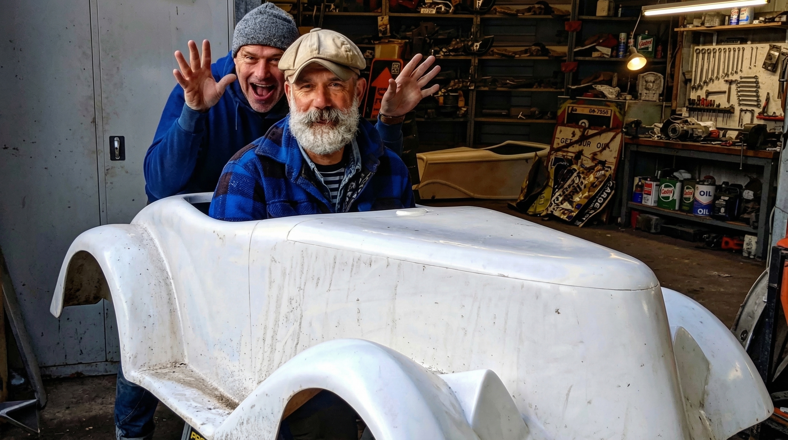 Steve and a friend in high spirits in a workshop